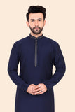 Man wearing a navy blue kurta with pants