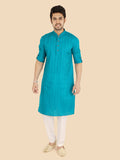 Man wearing a rama kurta with white pants