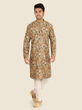 Man wearing a patterned pista kurta with white pants