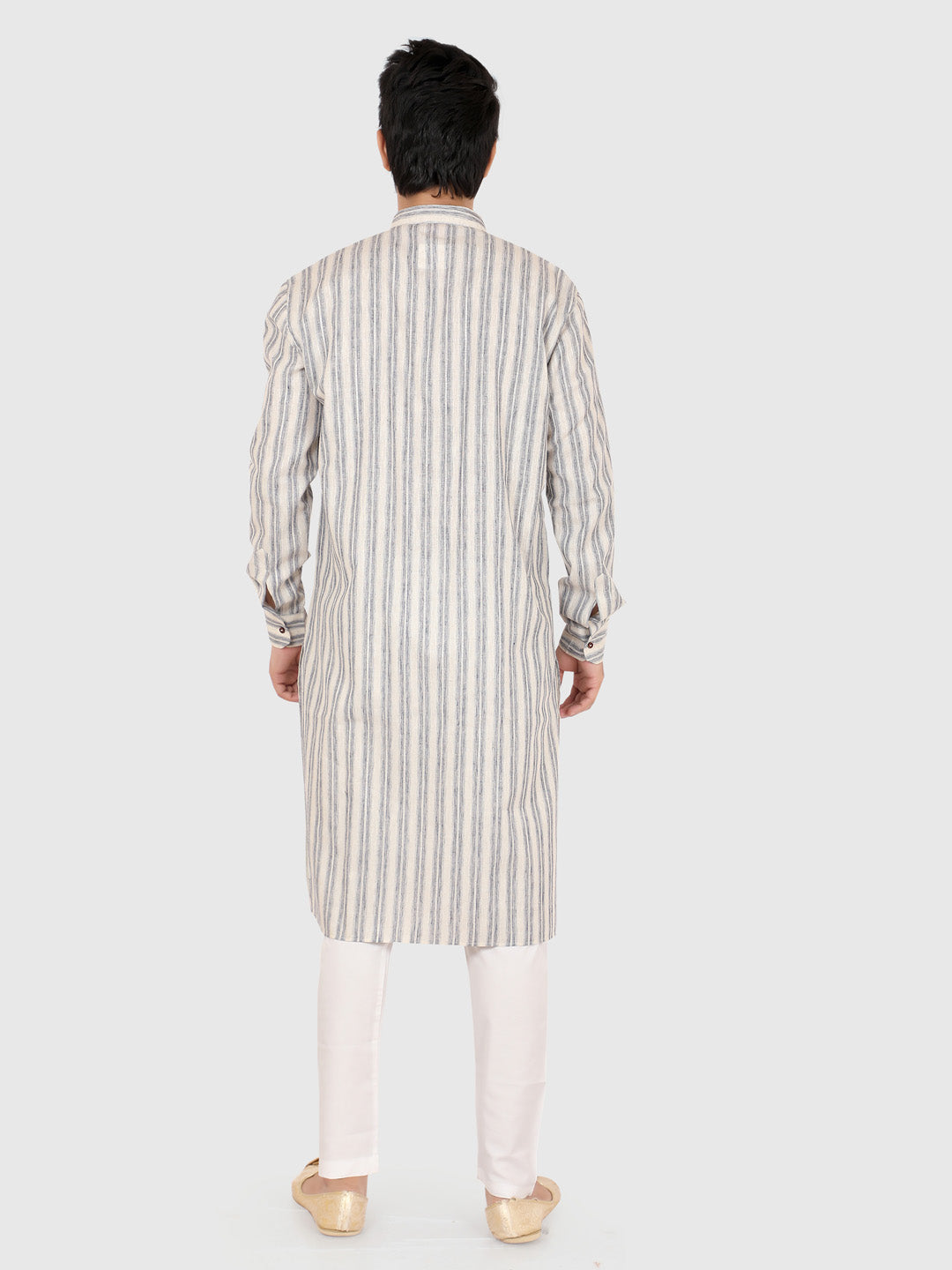 Person wearing a gray striped kurta with white pants 