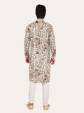 Person wearing a patterned cream kurta with white pants 