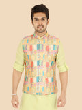 Man wearing a colorful patterned vest over a light green or parrot green shirt